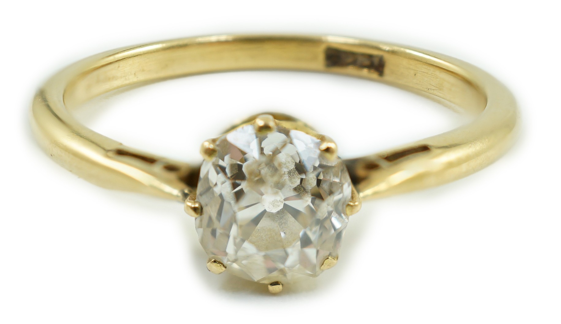 An 18ct and solitaire diamond ring